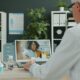 Doctor consults with patient via video call.