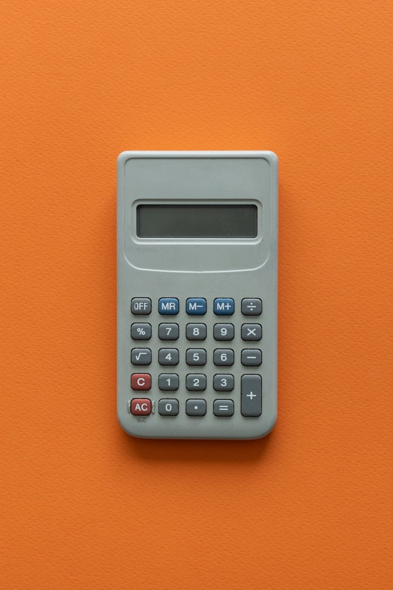 Contribution Margin Formula 16 a calculator on a table