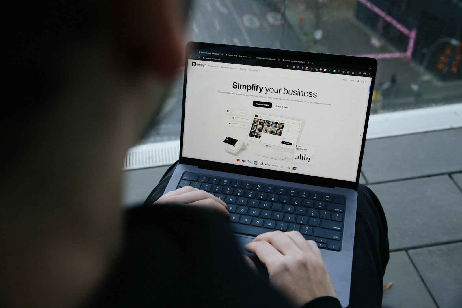 Fintech Tools to Spot Car Finance Mis-Selling in 2025 16 A man sitting on a bench using a laptop computer