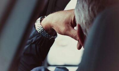 person wearing silver and gold bracelet