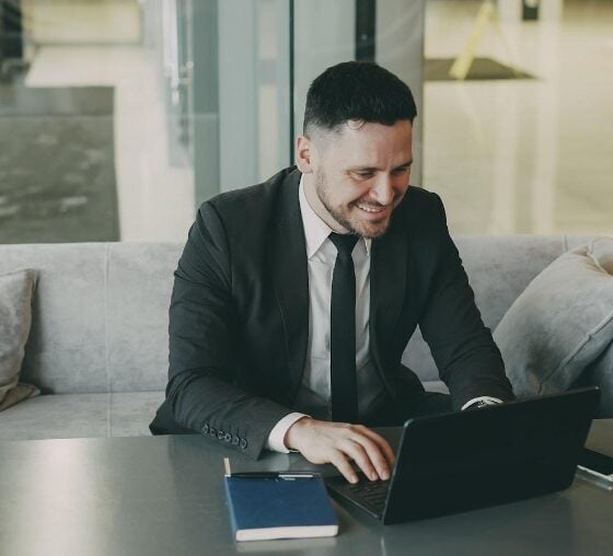 happy customer on laptop