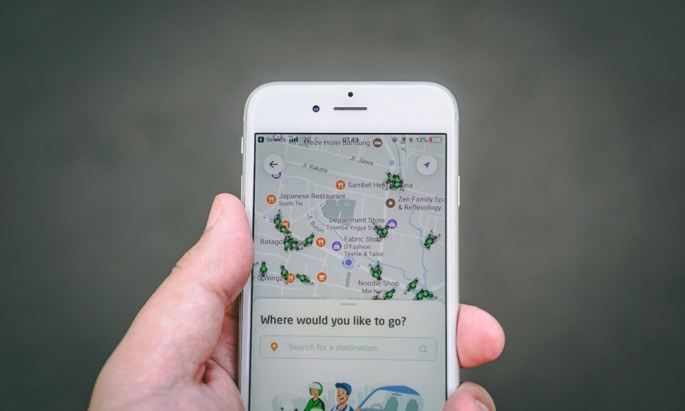 person holding silver iPhone 6