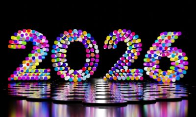 Colorful year 2026 text on reflective surface