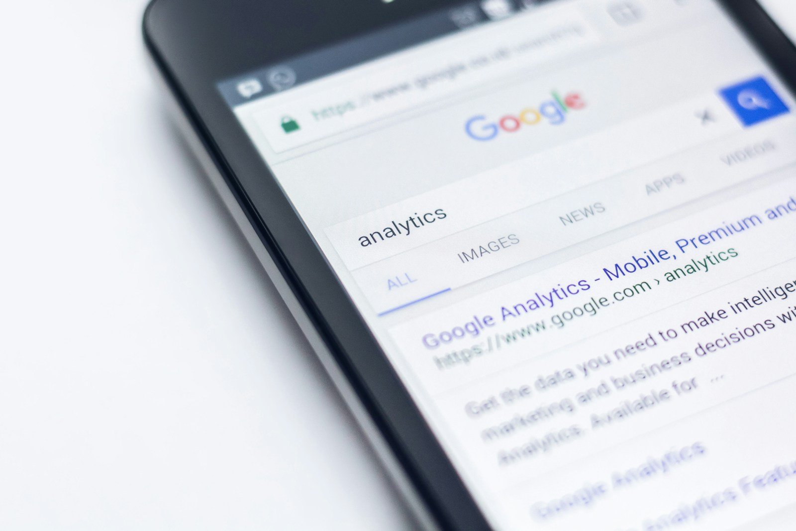smartphone showing Google site | Boost Rankings with a Serp Insight Guest Post