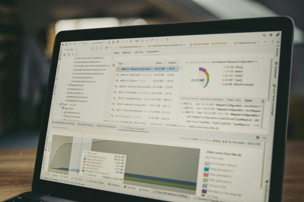 ICP Scoring Rubric B2B SaaS: Definition, Framework, and Examples 27 A close-up view of a laptop screen showing a coding and data analysis software interface in an indoor setting.