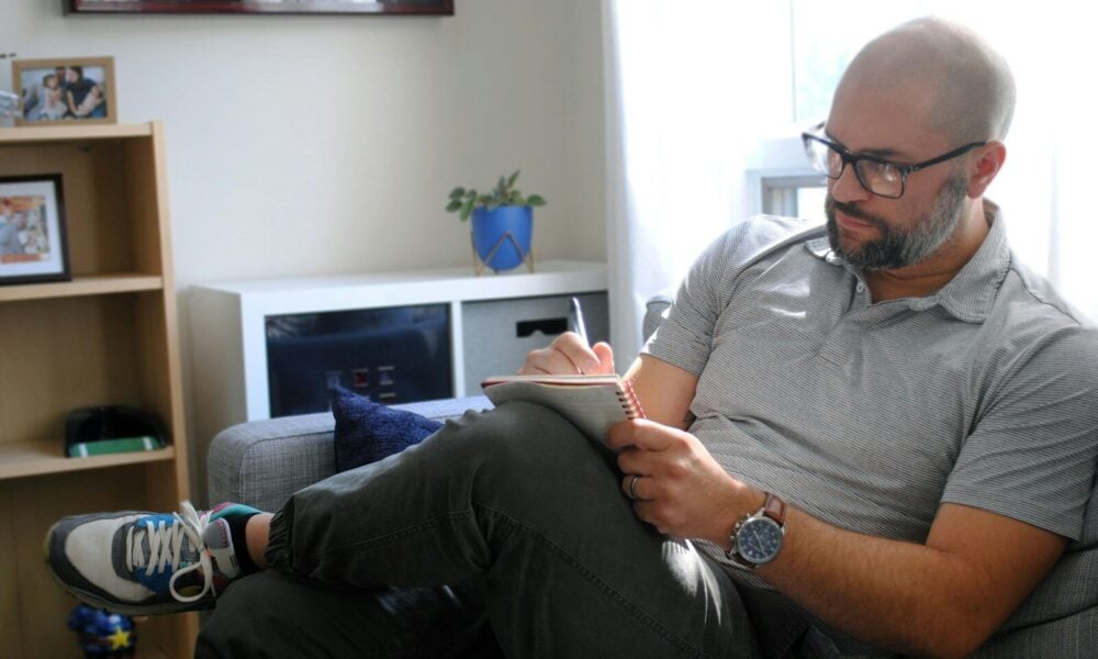 a man sitting on a couch