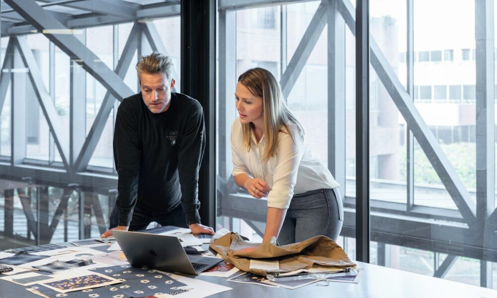 man and woman sitting at table