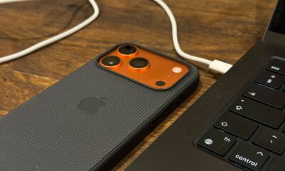 Smartphone connected to a laptop with a cable