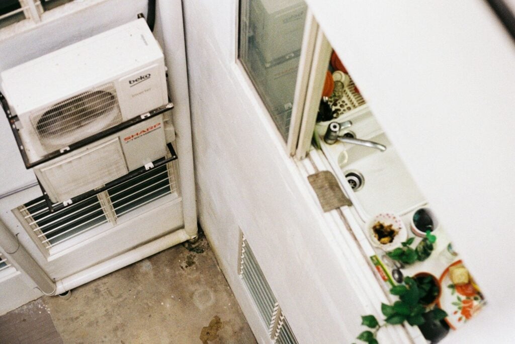 a white refrigerator freezer sitting inside of a kitchen