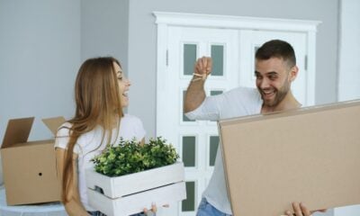 Couple happily moving into a new home