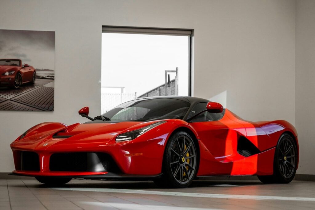 How to Trade a Financed Car in 2026? Complete Guide 27 red ferrari 458 italia parked in front of white wall