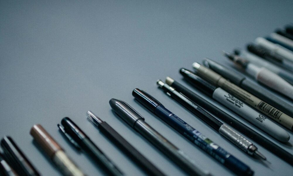 blue and silver click pen