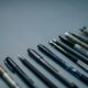 blue and silver click pen