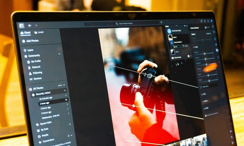 Photo editing software is shown on a laptop screen.