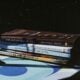 a stack of books sitting on top of a table