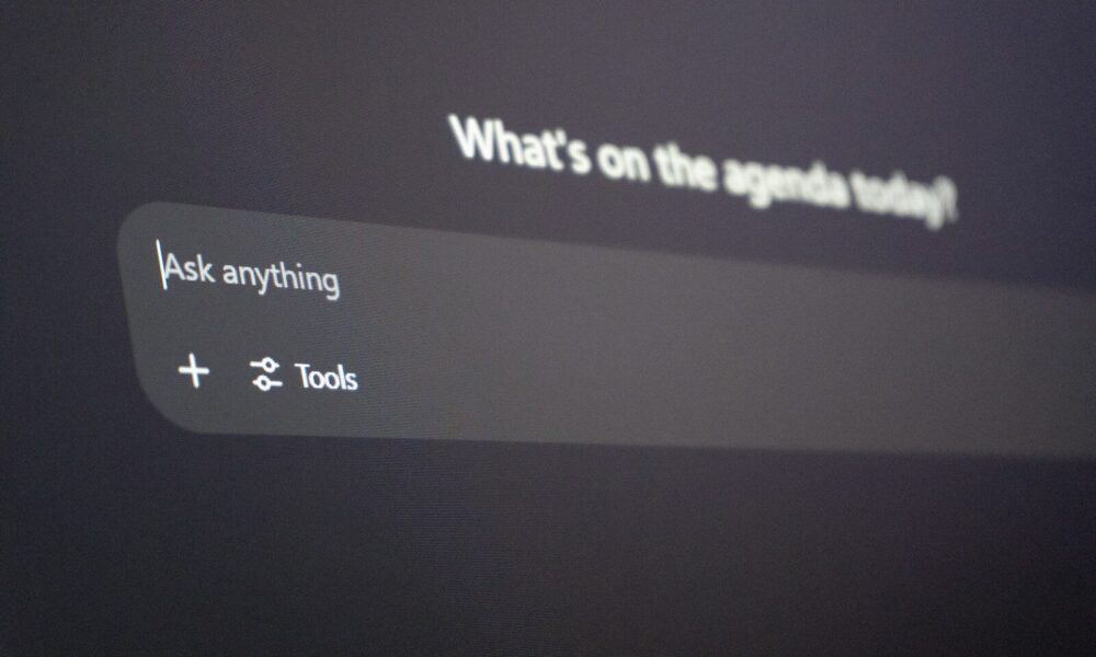 Digital interface with "ask anything" prompt.
