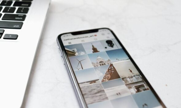 black android smartphone on white table