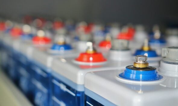 Rows of batteries with red and blue terminals