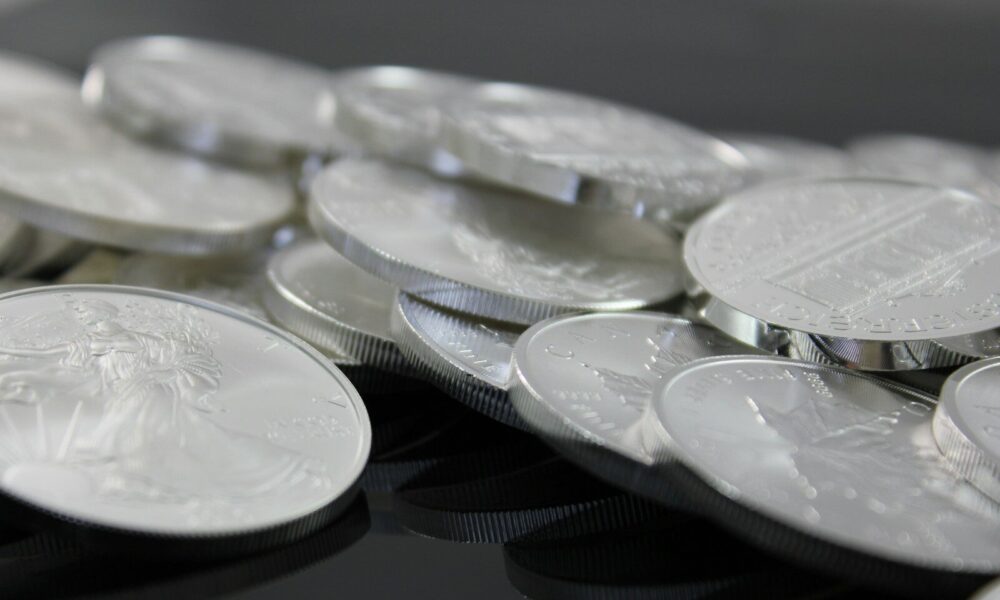 clear glass round plate on black textile
