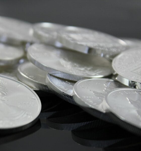 clear glass round plate on black textile
