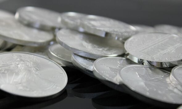 clear glass round plate on black textile