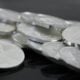 clear glass round plate on black textile