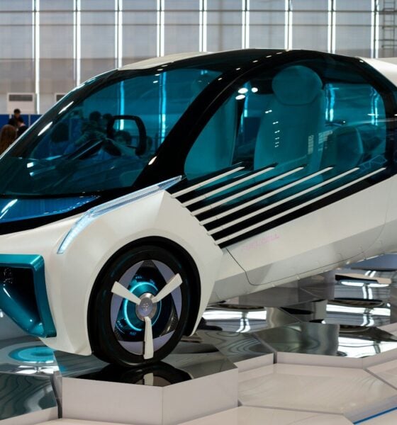 white and blue vehicle inside the building