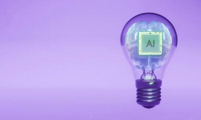 Ai brain inside a lightbulb illustrates an idea