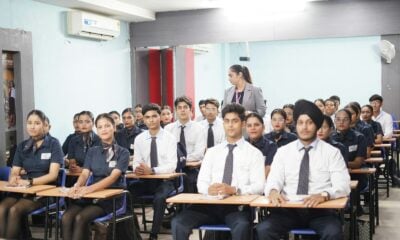 Students attending a lecture in a classroom