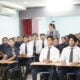 Students attending a lecture in a classroom