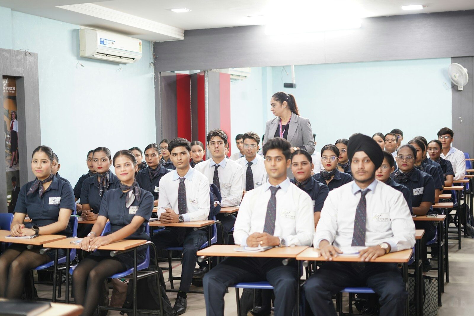 Students attending a lecture in a classroom