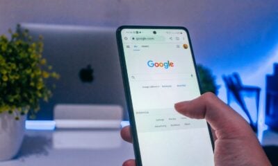 person holding white android smartphone