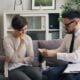 a man and a woman sitting on a couch