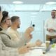 Man presenting to colleagues in a modern office setting