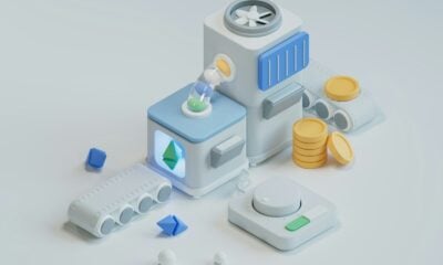 a robot with a bunch of coins around it