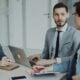Business professionals in a meeting around a table