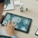 Doctor examining mri scans on a tablet screen